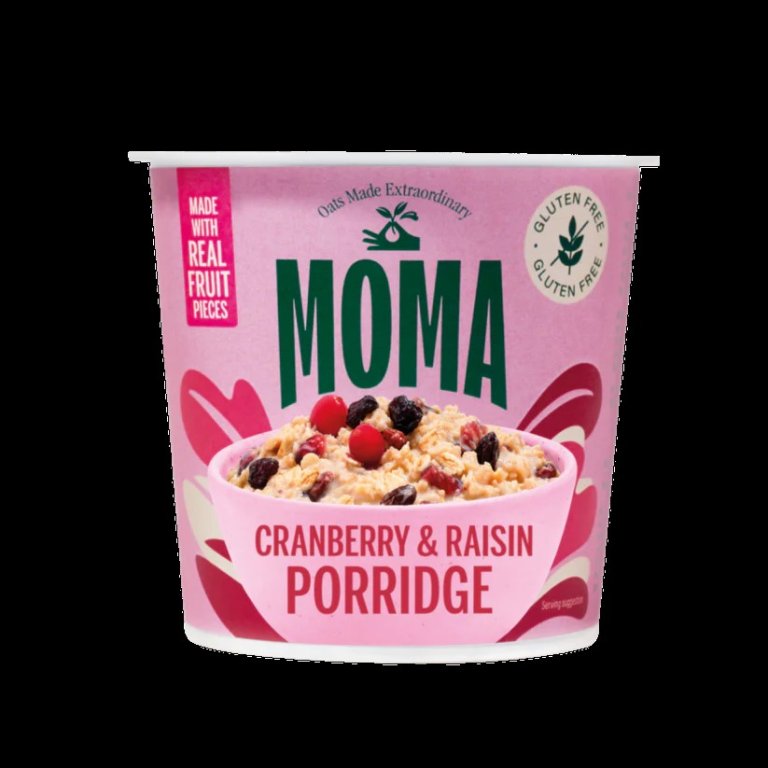 Rosa, rund boks med teksten MOMA Cranberry & Raisin Porridge og bilde av en skål med grøt med bær og rosiner på.