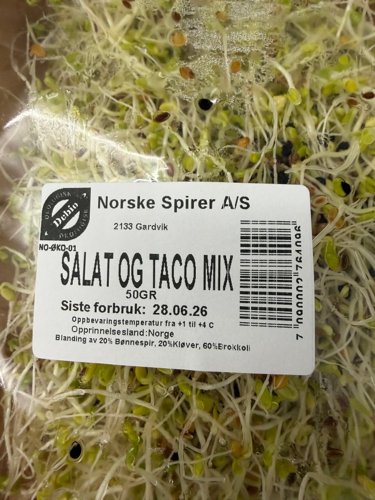 En pakke salat- og tacomix med plast rundt.