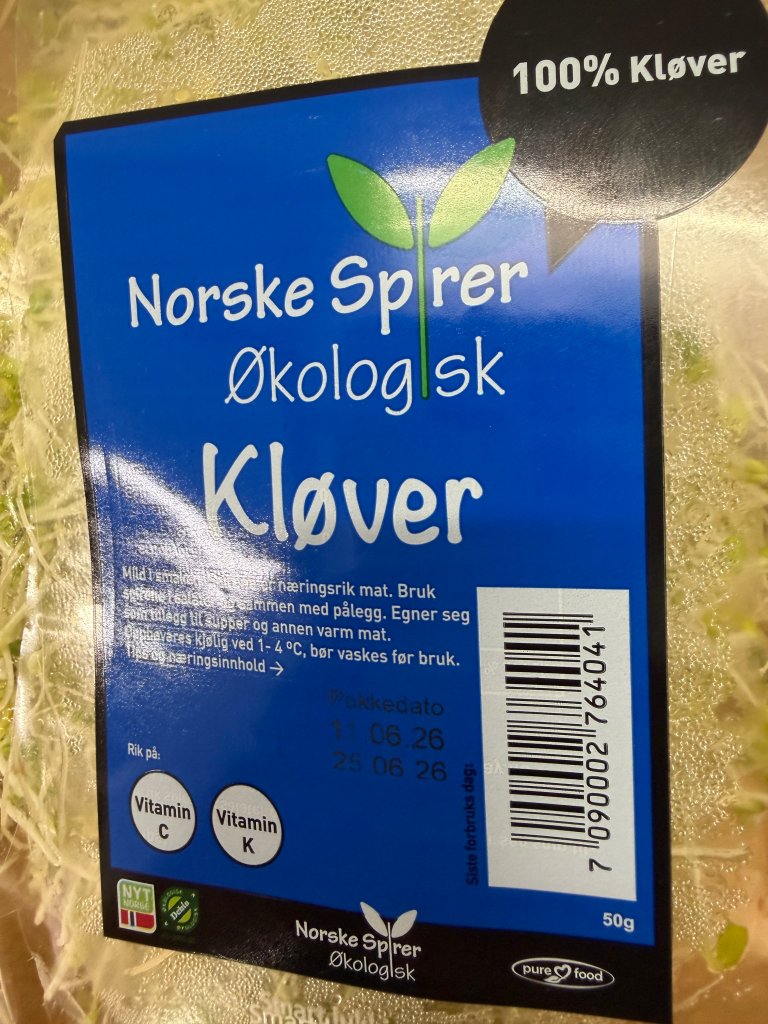 En pakke Norske Spirer Økologisk kløver med rød etikett og plastpakning.